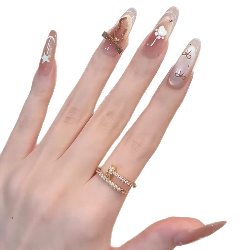 Glamorous artificial nails with creative embellishments Kalsten