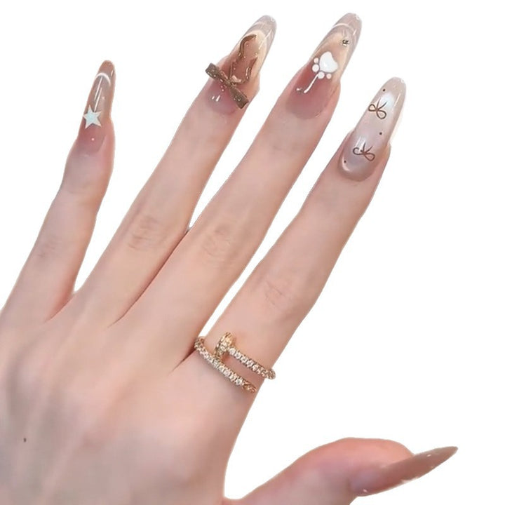 Glamorous artificial nails with creative embellishments Kalsten