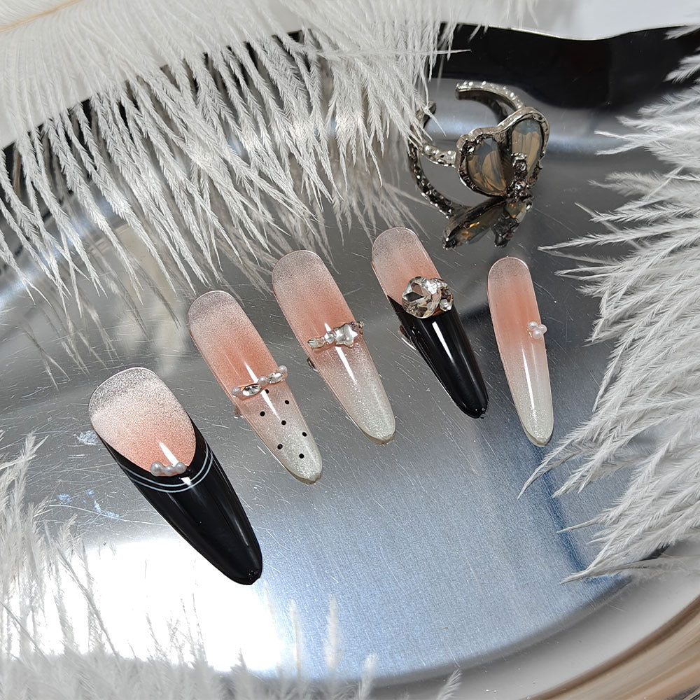Artificial nails in elegant design with glittering decorations Kalsten
