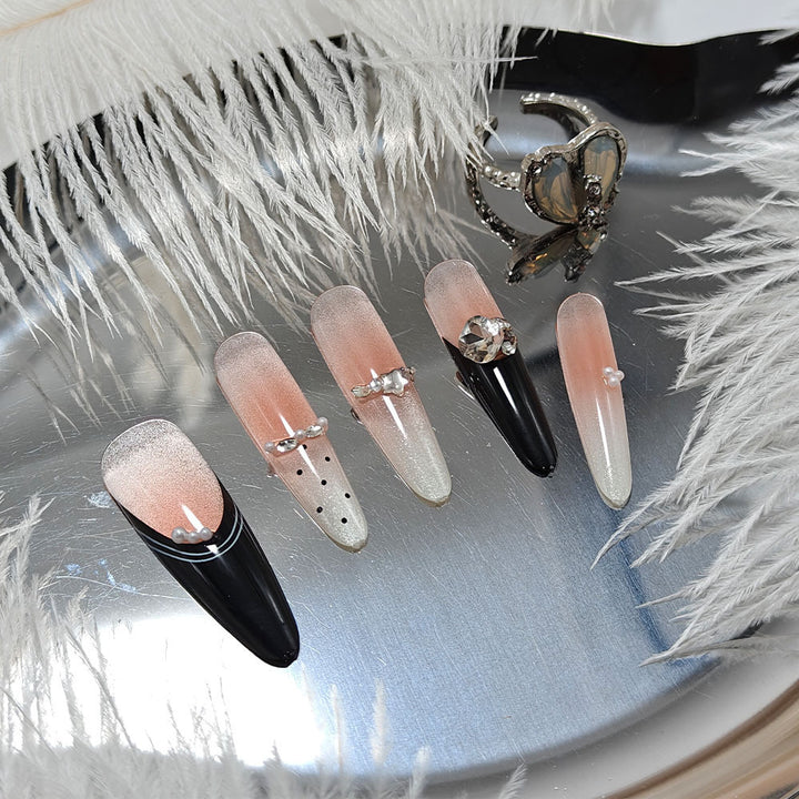 Artificial nails in elegant design with glittering decorations Kalsten