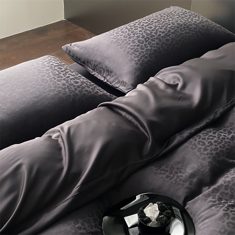 Luxurious satin bedding set with jacquard leopard pattern and silky-matte finish