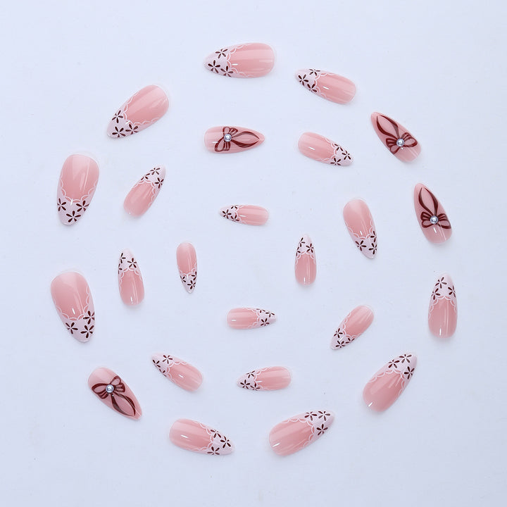 Elegant artificial nail design with floral accents Kalsten