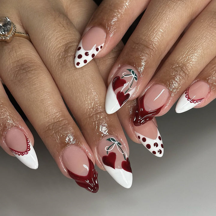Creative nail art set with romantic heart design and playful accents Kalsten
