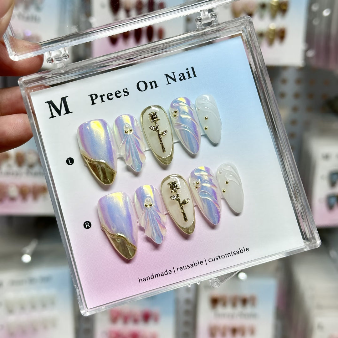 Artistic Press-On Nail Set with Floral and Green Accents
