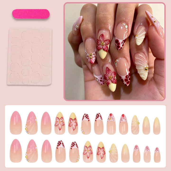 Art nail set with creative floral design and glittering accents Kalsten