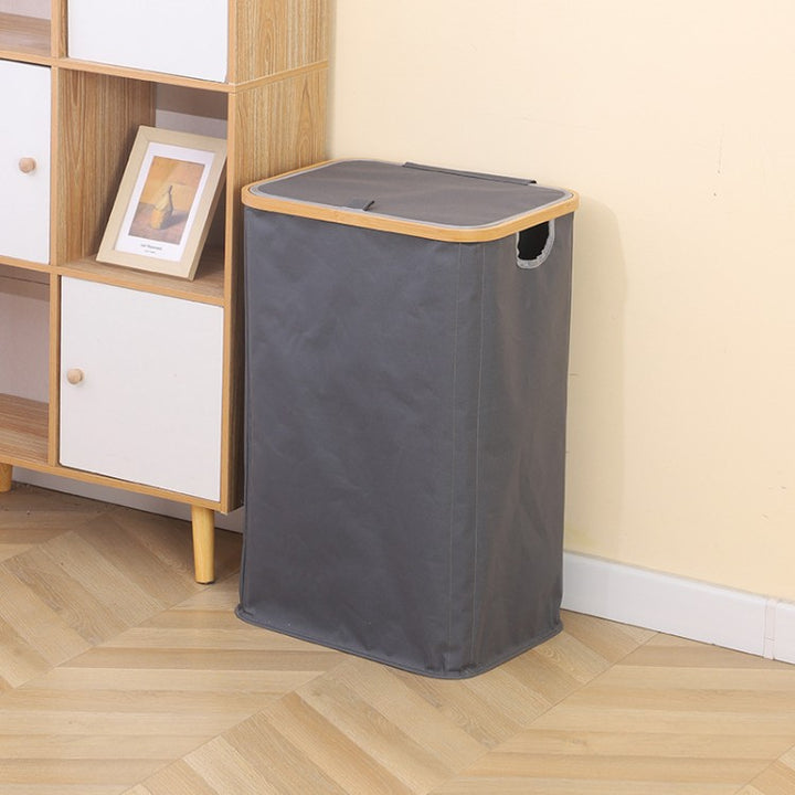Stylish laundry basket with wooden lid Kalsten