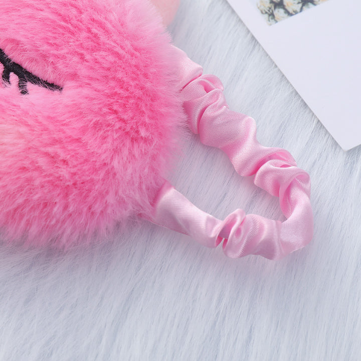 Women's plush-filled unicorn sleep mask with 3D horn, embroidered eyelashes and adjustable satin band Kalsten