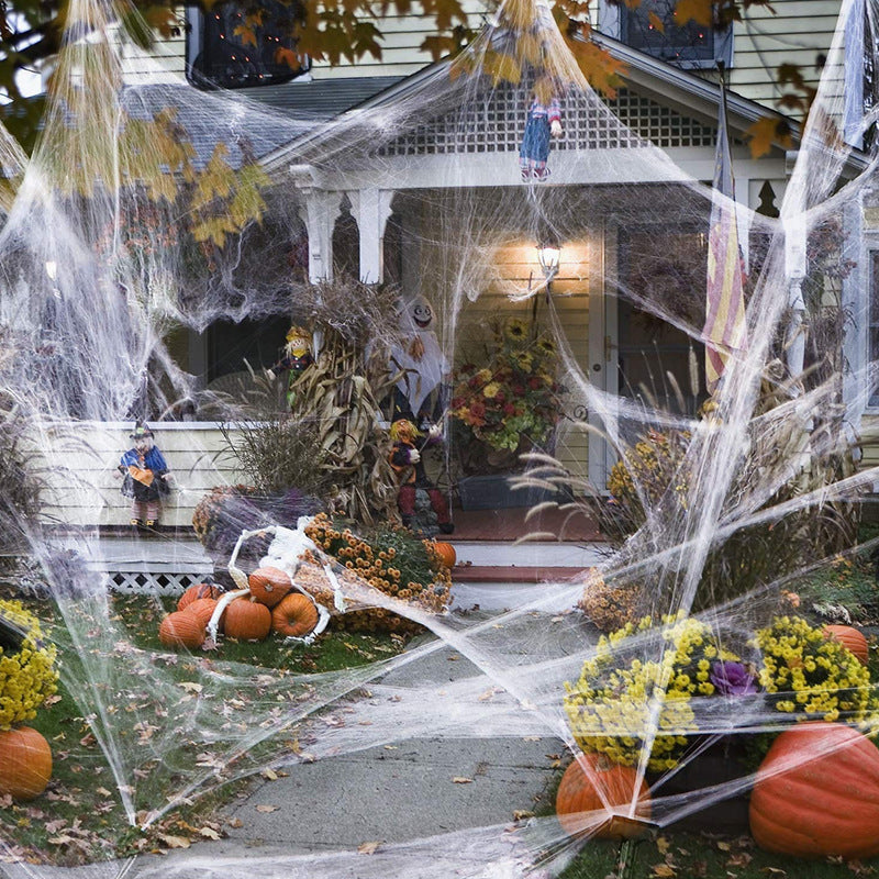 Decorative spider web with artificial spiders