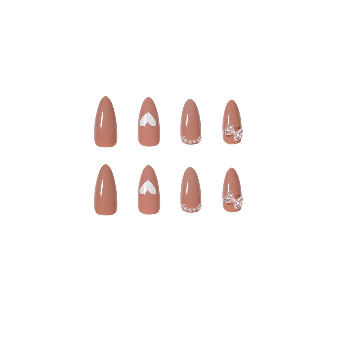 Elegant artificial nails with heart-shaped and glitter accents Kalsten
