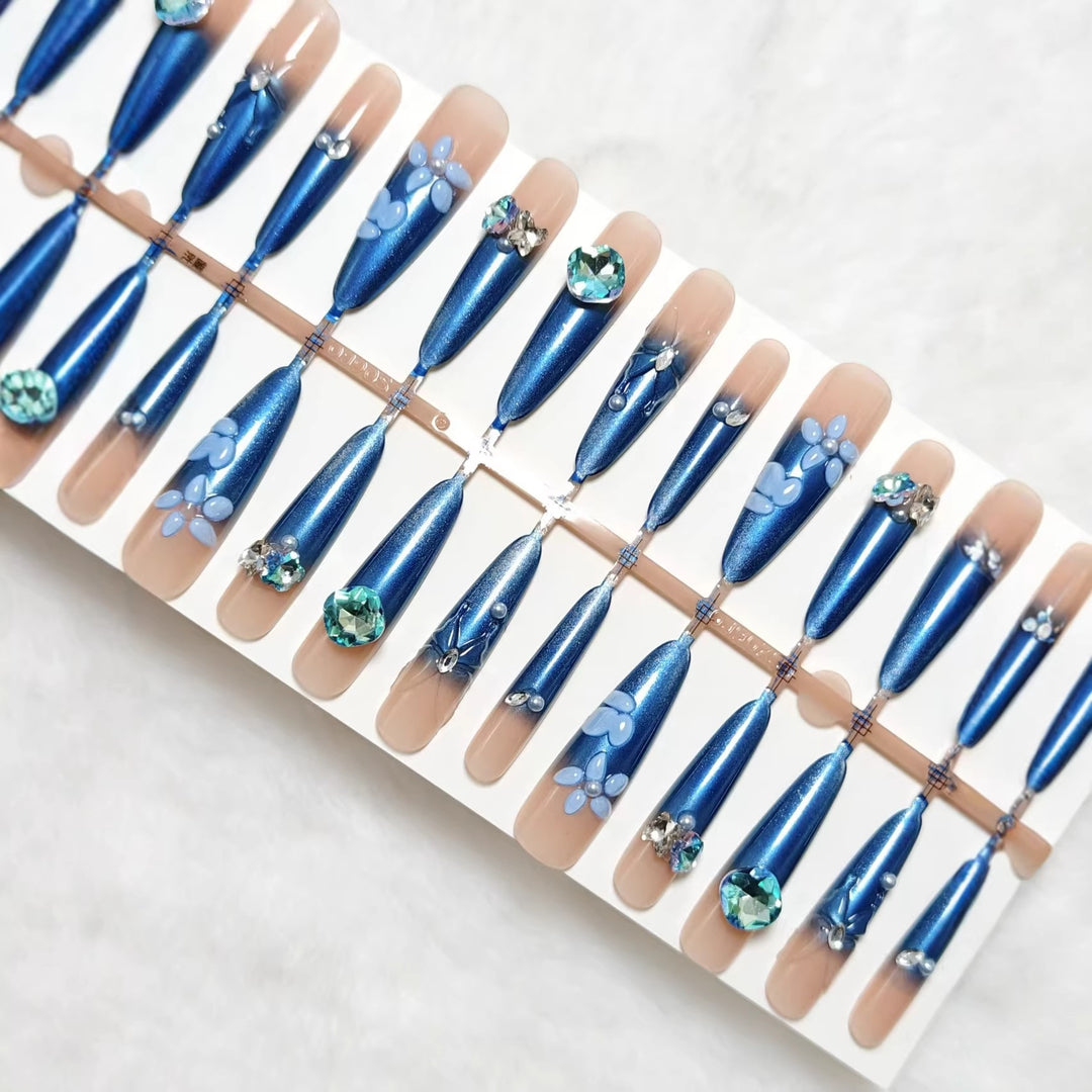 Elegant artificial nails with floral applications and glitter elements Kalsten