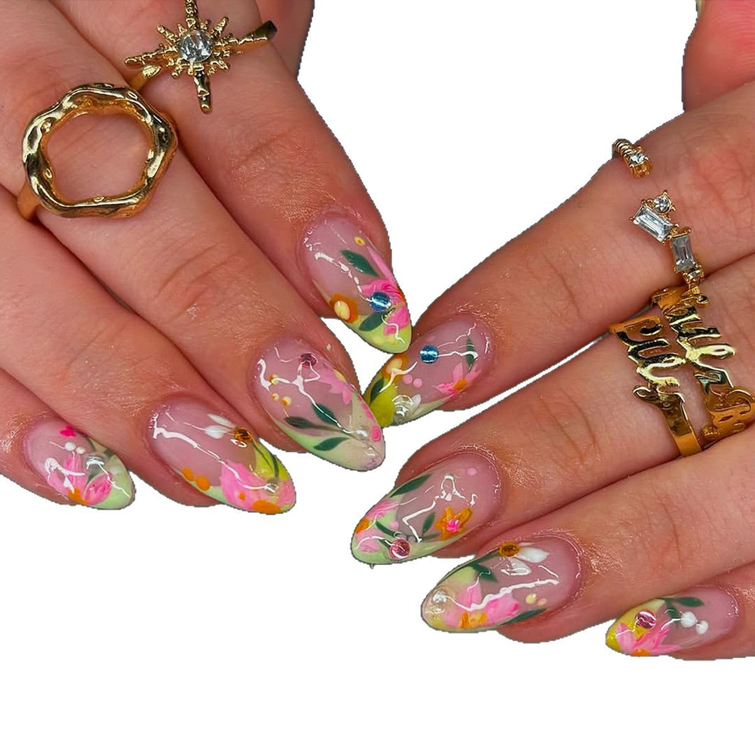Artificial nails with flower design and glitter accents Kalsten