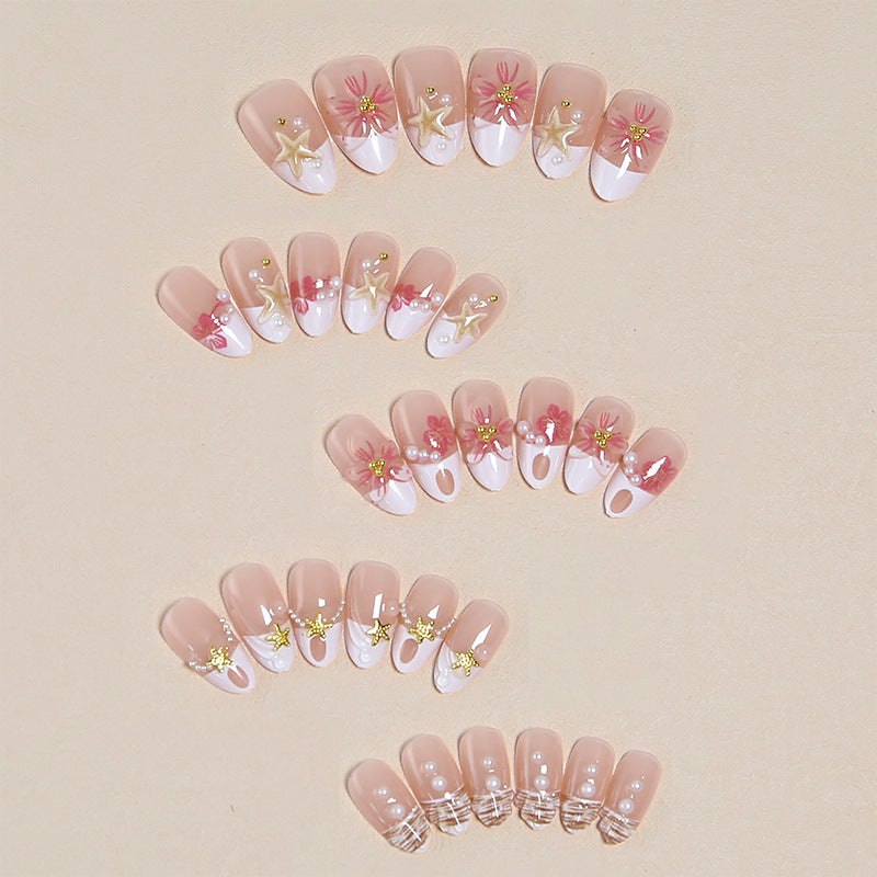 Elegant artificial nails with floral designs and glitter accents Kalsten