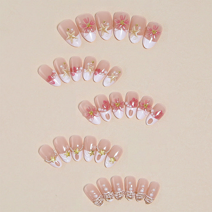 Elegant artificial nails with floral designs and glitter accents Kalsten