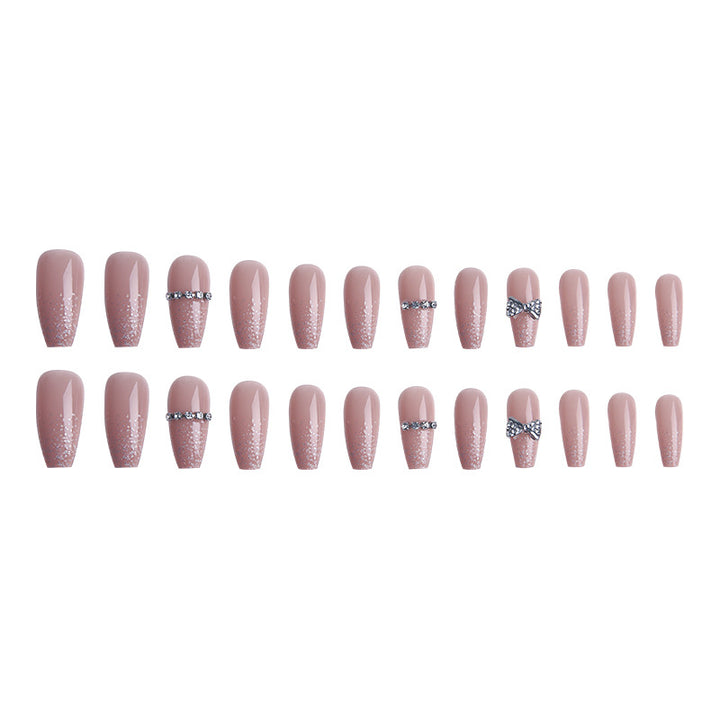 Glamorous artificial nails with sparkling rhinestone and glitter elements Kalsten
