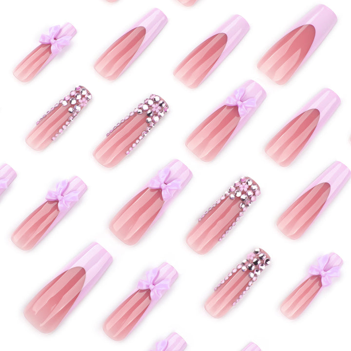Artful Nail Art with Rhinestone Accents and Bows Kalsten