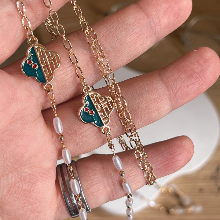 Artistic Gold-Plated Eyewear Chain with Decorative Cloud Charm Kalsten