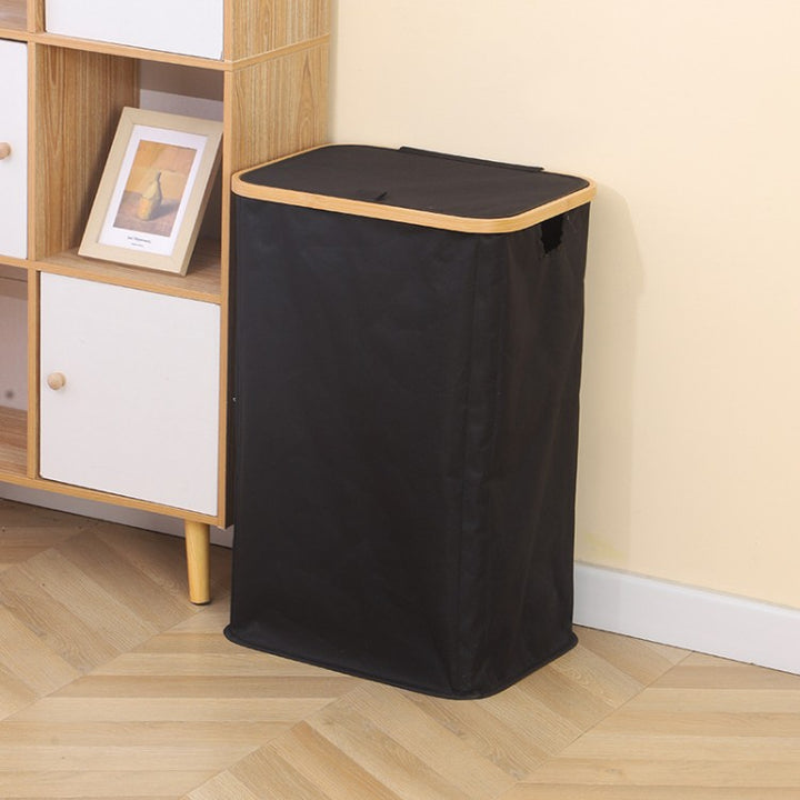 Stylish laundry basket with wooden lid Kalsten