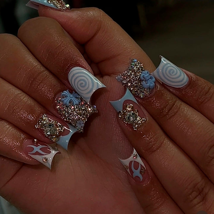Artful nail art with cute animal motifs and glitter accents Kalsten