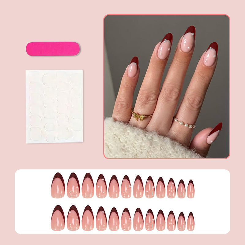 Acrylic nail set with elegant French tip and glamorous accents Kalsten