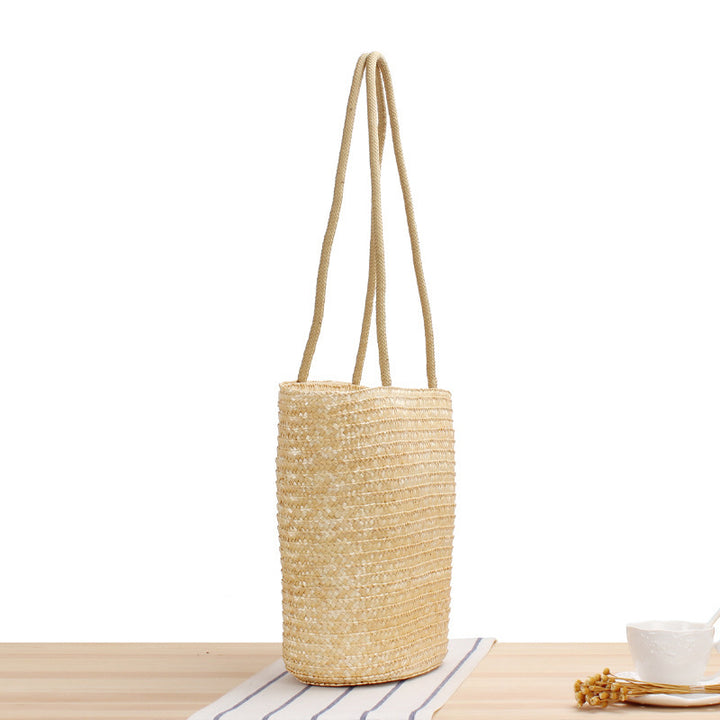 Handcrafted straw bag with long handles Kalsten