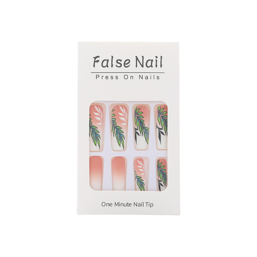 Artificial nails with elegant ombre design and floral accents Kalsten