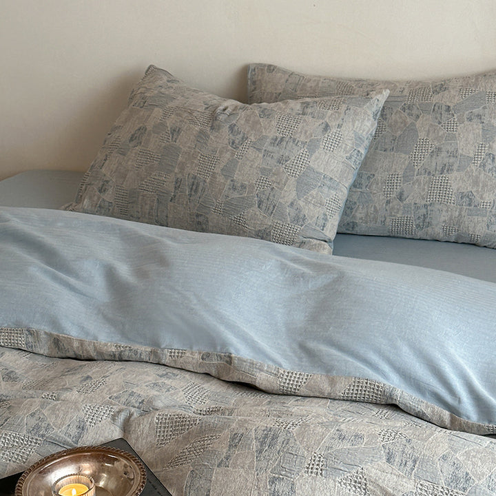 Bedding set made of linen-cotton mix with geometric patchwork design