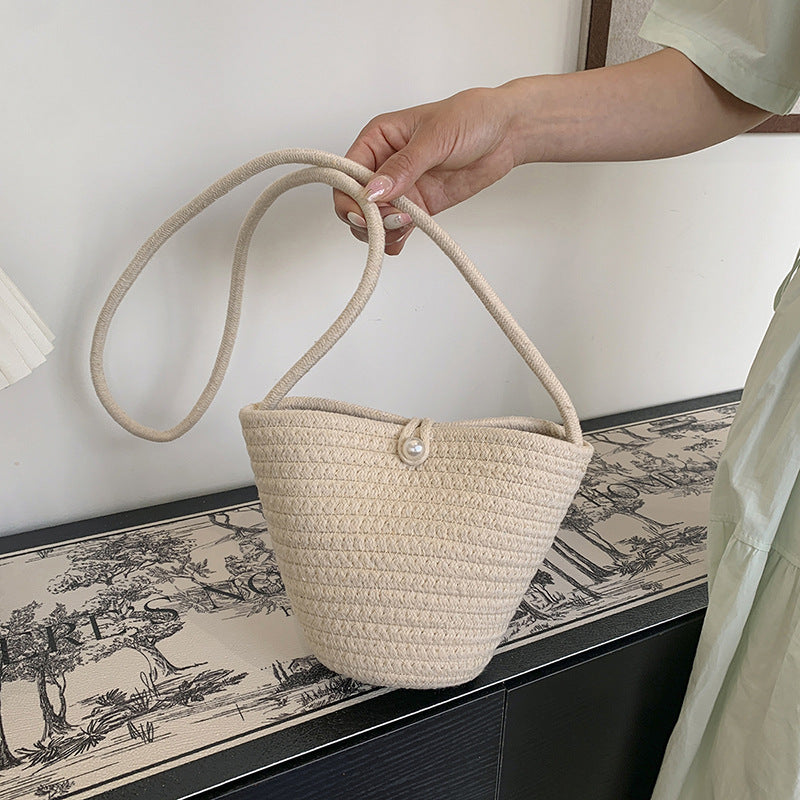 Woven Pearl Accent Handbag