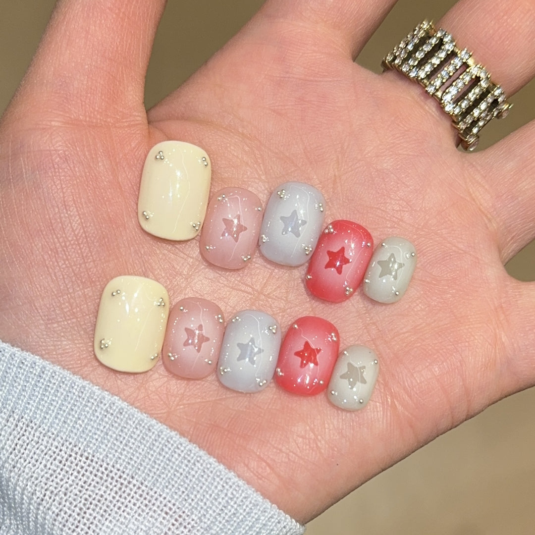 Artificial nails with sparkling star motifs Kalsten