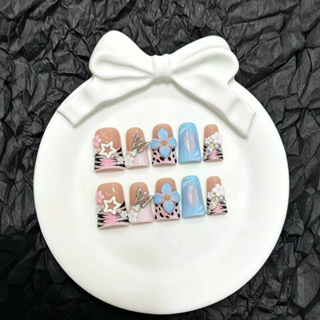 Artistic Nail Art Press-On Set with Floral and Gem Accents