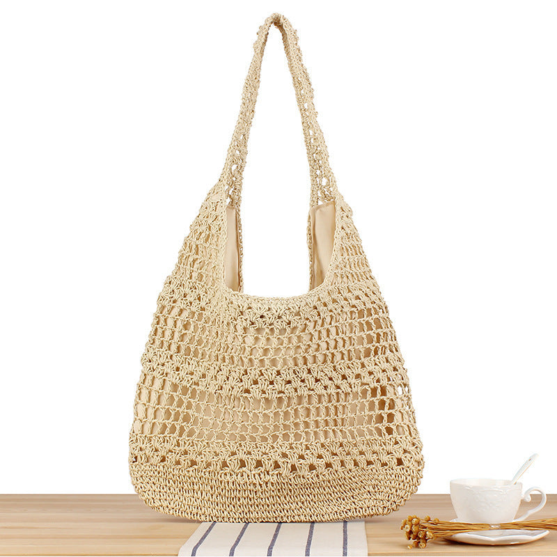 Handbag with floral appliqué Made of natural material Kalsten