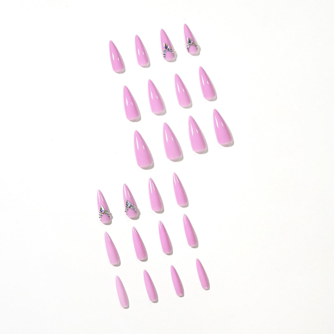 Glamorous stiletto nails with rhinestone decoration Kalsten