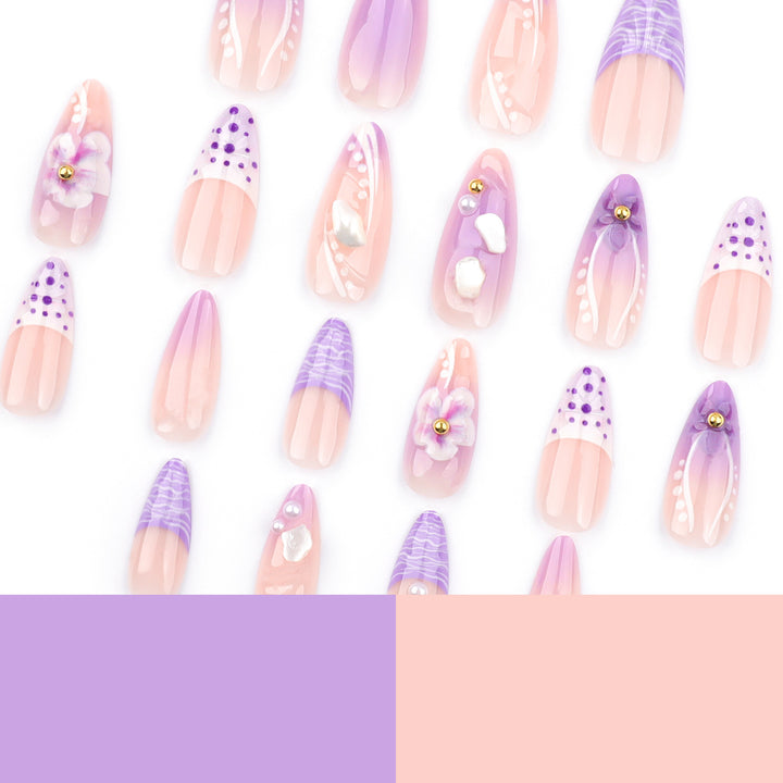 Artful nail extensions with elegant floral embellishments Kalsten