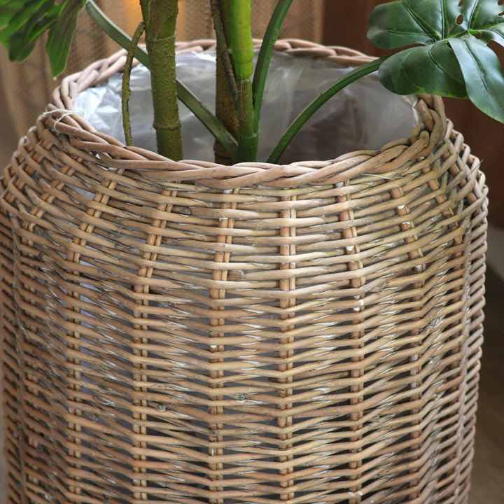 Stylish laundry basket made of braided natural material Kalsten