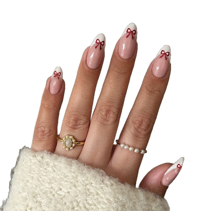 Artificial nail set with playful bow design Kalsten