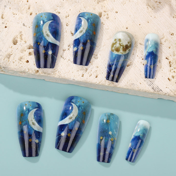 Dreamy artificial nails with moon and star design Kalsten