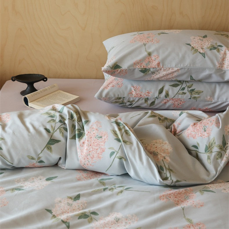 Cotton satin bedding set with fine check pattern and floral motifs