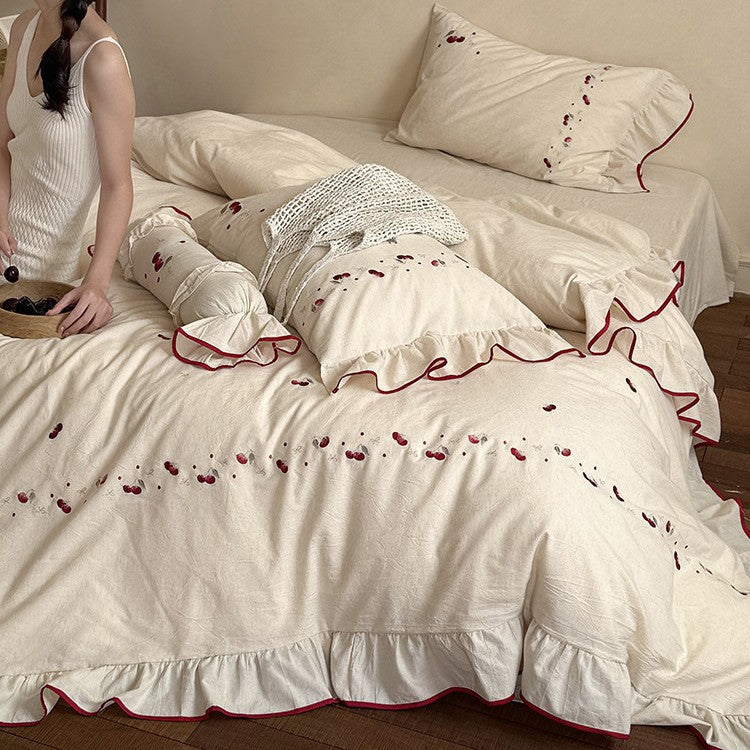 Bedding set with delicate cherry embroidery, ruffle and linen look