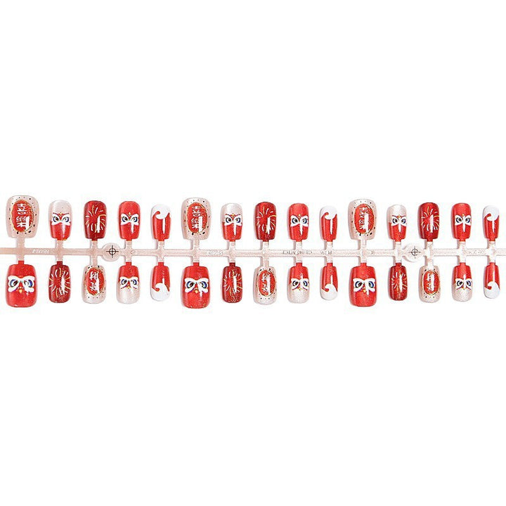 Fake nail set with unique animal motifs and elegant accents Kalsten