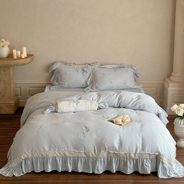 Romantic bedding set made of linen-cotton blend with ruffles and floral embroidery