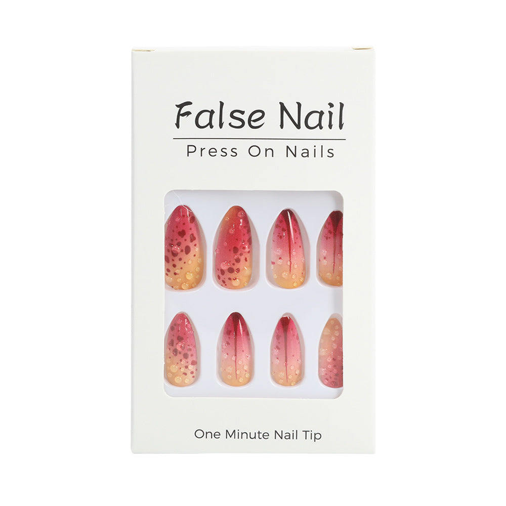 Creative artificial nails with appealing ombre and glitter effects Kalsten