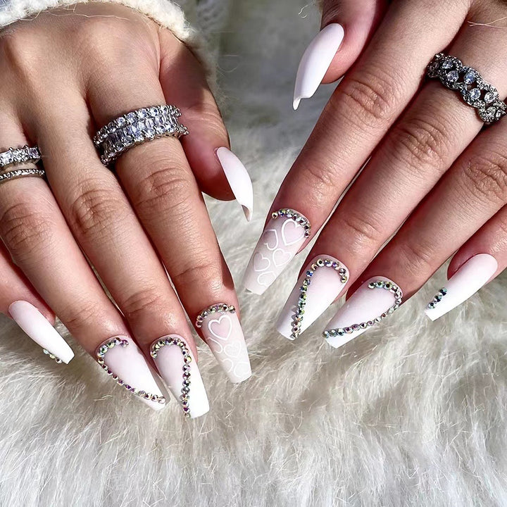 Artful Nail Extensions with Heart Design and Glitter Accents Kalsten