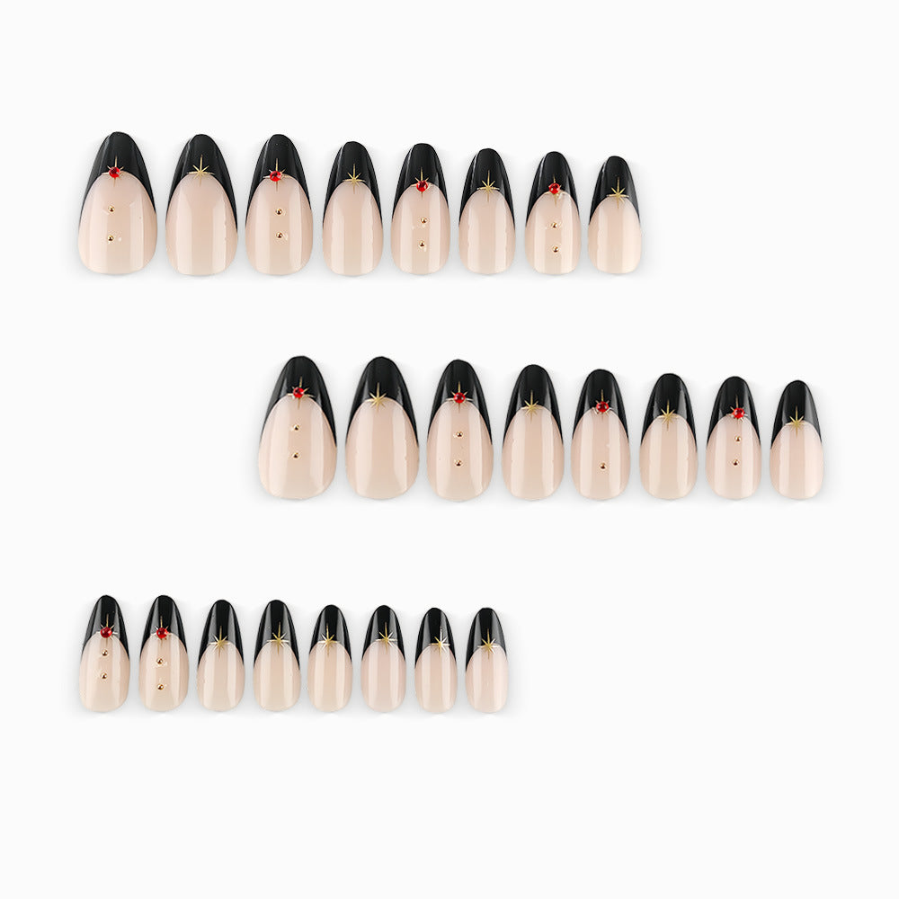 Glamorous artificial nails in stylish stiletto design with golden accents Kalsten