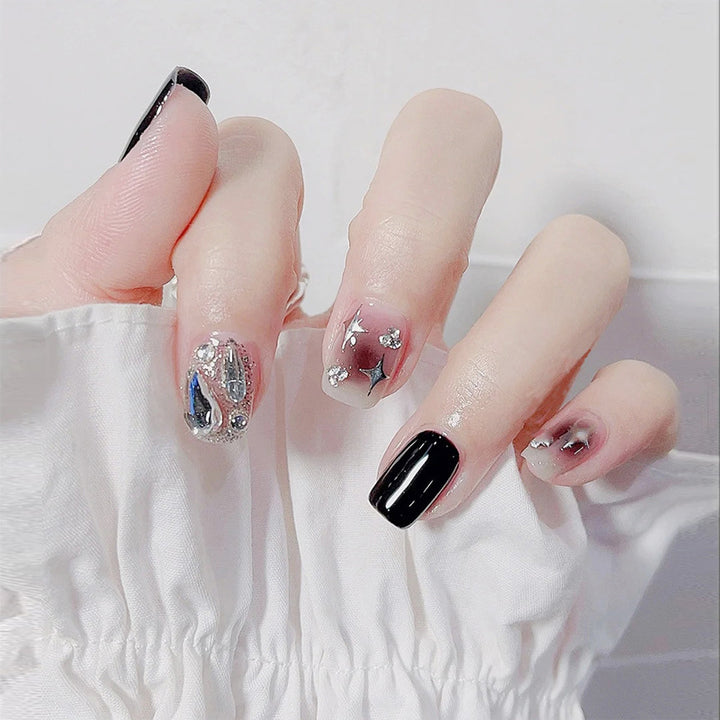 Artificial nail set with glamorous glitter and crystal decorations Kalsten
