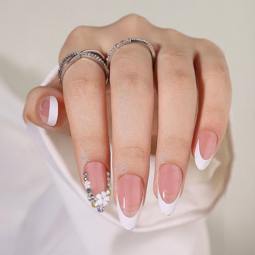 Artificial nails with elegant French tips and rhinestone details Kalsten