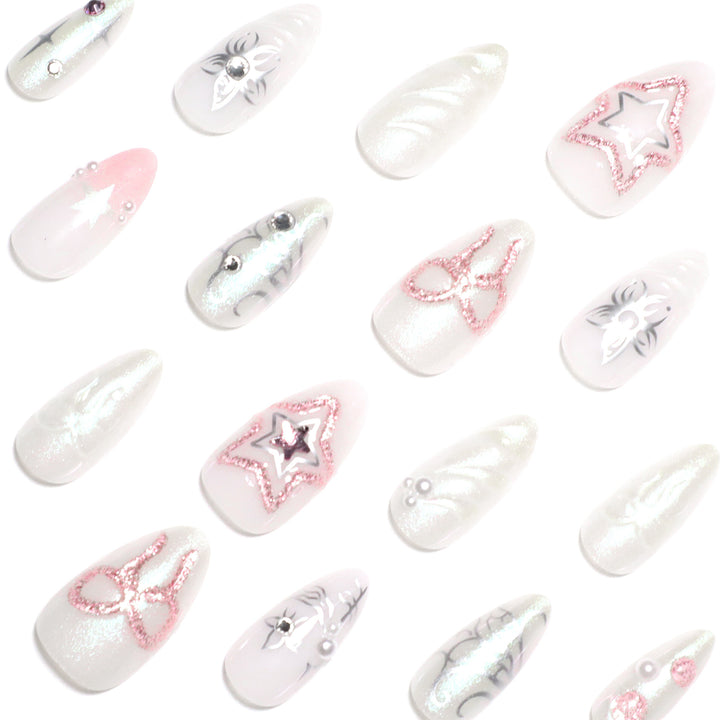 Artistic nail extensions with shiny embellishments Kalsten