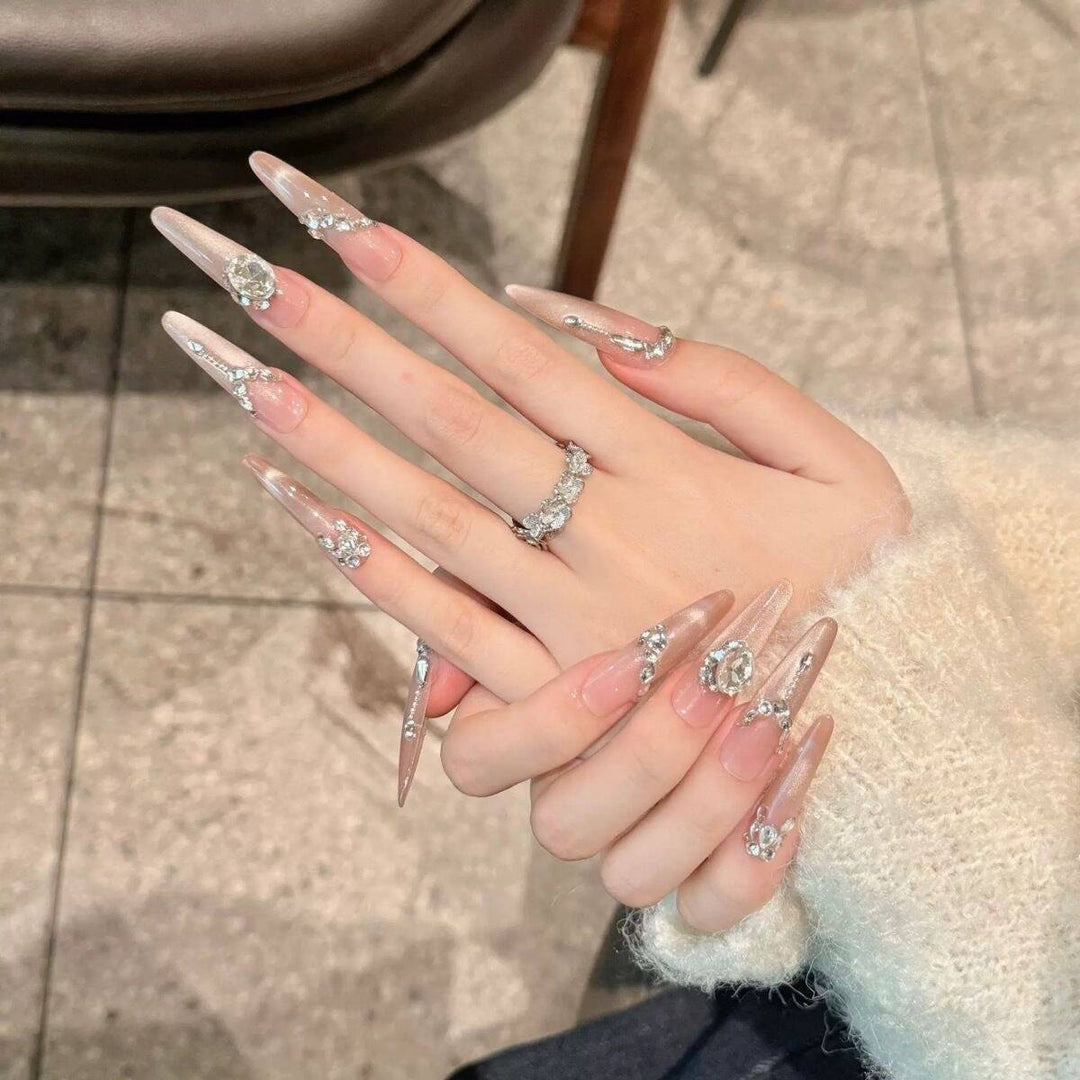 Artistic Stiletto Press-On Nail Art with Glimmering Accents Kalsten