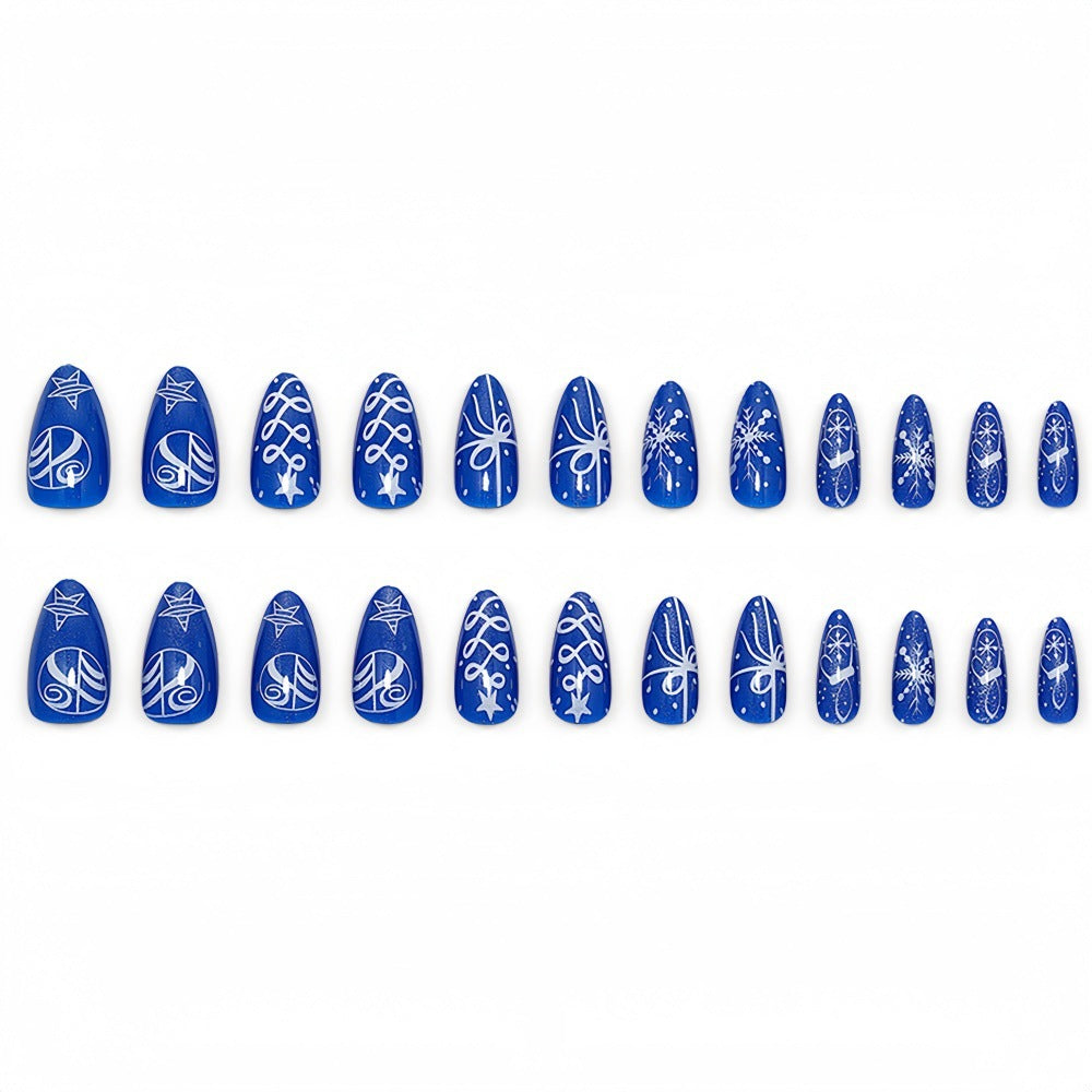 Artificial nails in festive winter design with glittering snowflakes and elegant decorations Kalsten