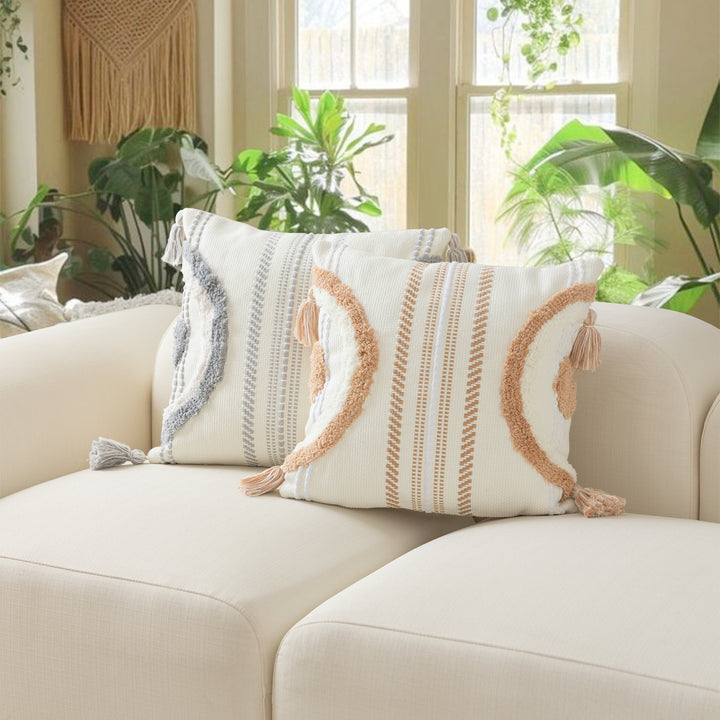 Woven decorative cushion cover with semi-circular tuft appliqué, fringe tassels, and concealed zipper Kalsten