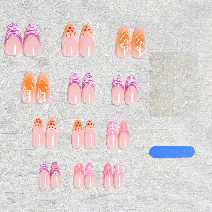 Acrylic nail set with exotic flower patterns and glitter accents Kalsten