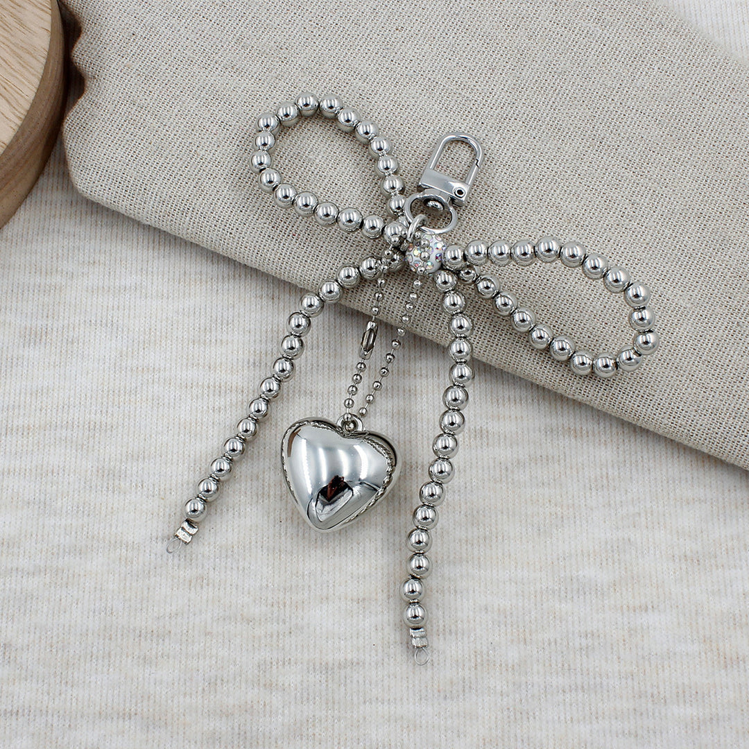 Elegant Beaded Bow Brooch Kalsten